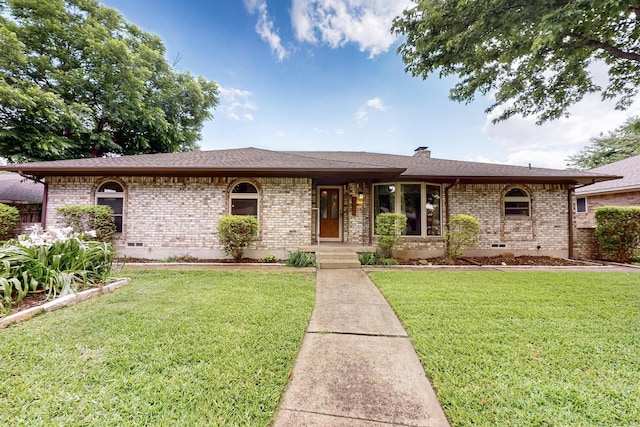 1308 Warwick St, Garland, TX 75040 - single story home with brick siding, crawl space, a front lawn, and a chimney