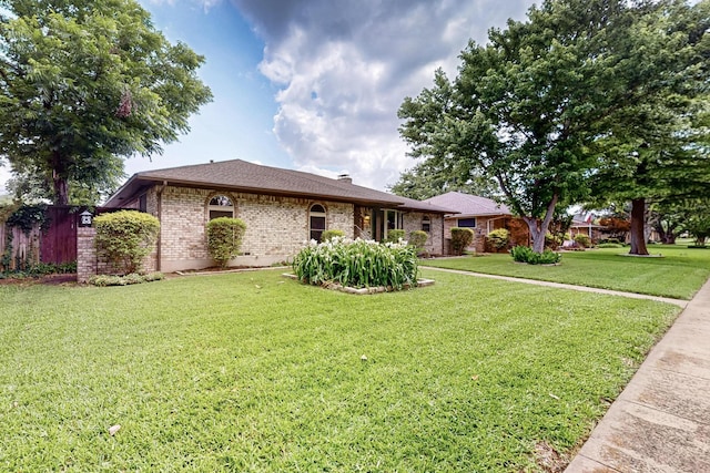 1308 Warwick St, Garland, TX 75040 - single story home featuring brick siding and a chimney