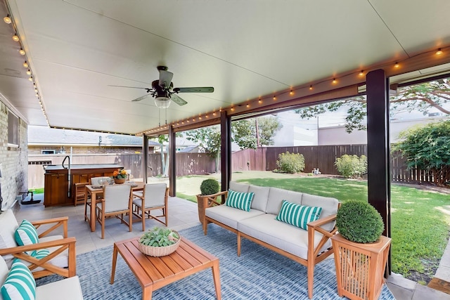 1308 Warwick St, Garland, TX 75040 - view of patio / terrace with an outdoor hangout area, a hot tub, outdoor dining area, and a ceiling fan