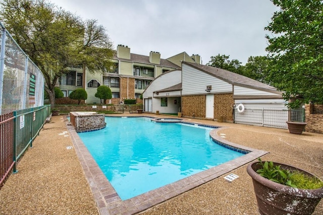 6108 Abrams Rd Unit 601, Dallas, TX 75231 - community pool with an in-ground hot tub