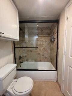 6108 Abrams Rd Unit 601, Dallas, TX 75231 - full bath featuring toilet and shower / bath combination with glass door