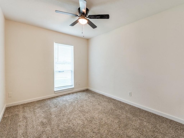 5201 Keller Cir, The Colony, TX 75056 - spare room featuring carpet floors, a ceiling fan, and baseboards