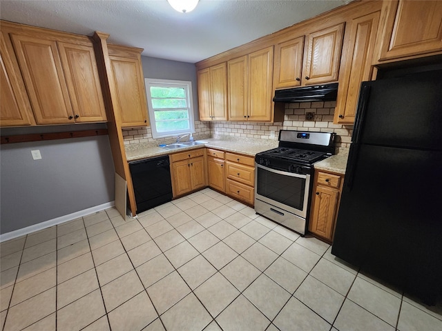 1510 Leslie St, Bossier City, LA 71111 - kitchen with black appliances, under cabinet range hood, a sink, backsplash, and light tile patterned floors