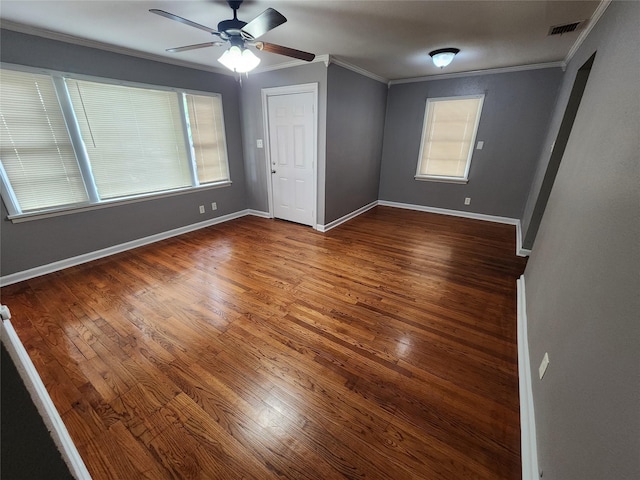1510 Leslie St, Bossier City, LA 71111 - empty room featuring ornamental molding, wood finished floors, a ceiling fan, and baseboards