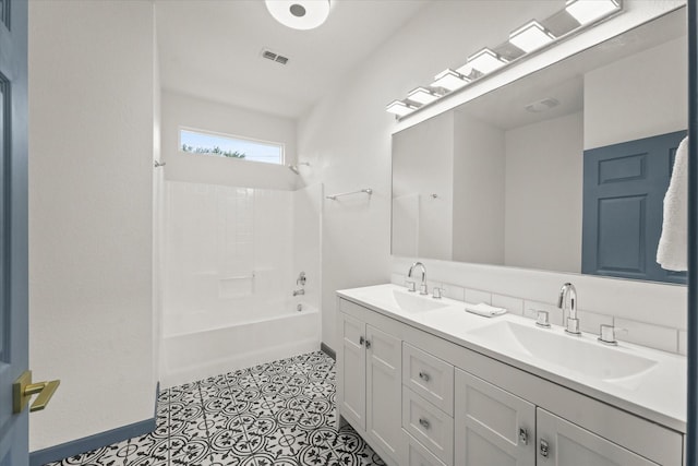 4706 Spring Ave, Dallas, TX 75210 - full bath featuring double vanity and  shower combination
