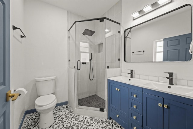 4706 Spring Ave, Dallas, TX 75210 - full bathroom with double vanity, a stall shower, and tile patterned floors