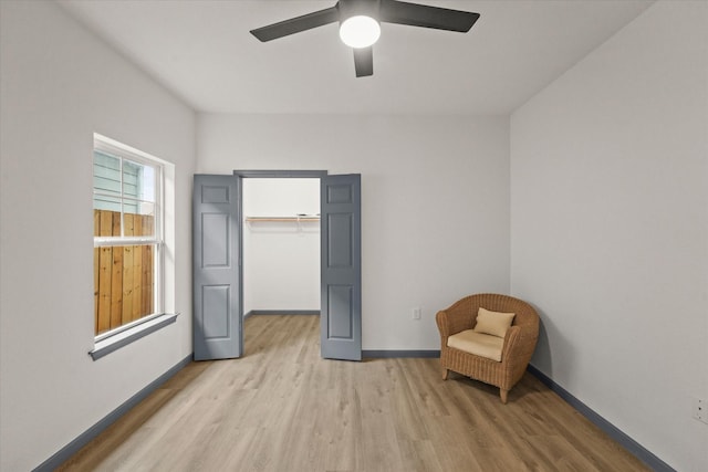 4706 Spring Ave, Dallas, TX 75210 - unfurnished room featuring light wood-style flooring, a ceiling fan, and baseboards
