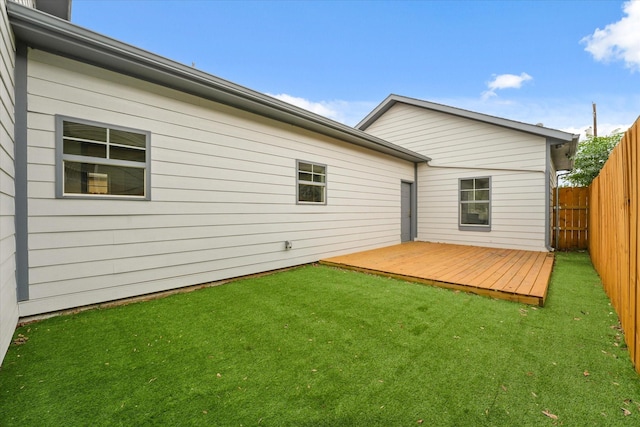 4706 Spring Ave, Dallas, TX 75210 - back of property with a fenced backyard and a deck