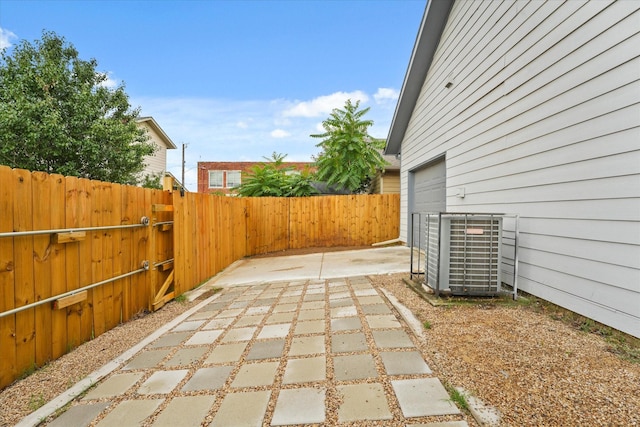4706 Spring Ave, Dallas, TX 75210 - fenced backyard featuring a patio and a garage