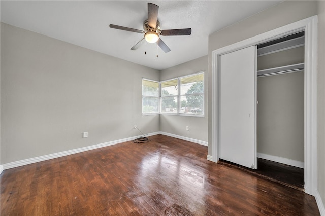 6423 Fisher Rd, Dallas, TX 75214 - unfurnished bedroom featuring wood finished floors, baseboards, a closet, and ceiling fan