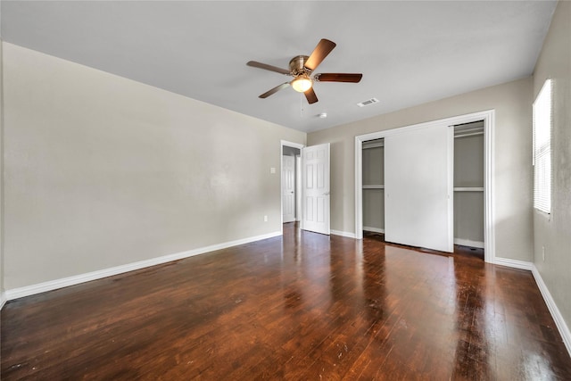 6423 Fisher Rd, Dallas, TX 75214 - unfurnished bedroom with wood finished floors, baseboards, a closet, and a ceiling fan