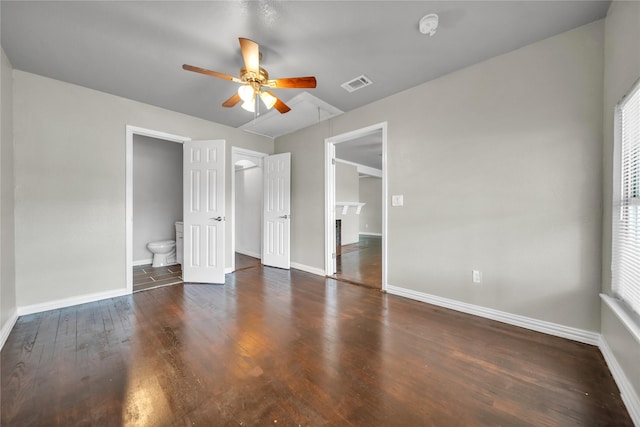 6423 Fisher Rd, Dallas, TX 75214 - unfurnished bedroom with baseboards, wood finished floors, connected bathroom, and a ceiling fan