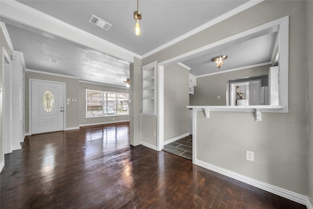 6423 Fisher Rd, Dallas, TX 75214 - foyer entrance featuring baseboards, hardwood / wood-style flooring, a ceiling fan, and ornamental molding