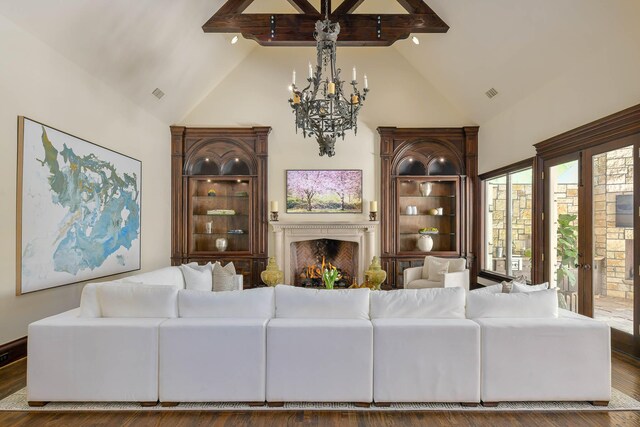9996 Hollow Way Rd, Dallas, TX 75220 - living room with high vaulted ceiling, a lit fireplace, a chandelier, wood finished floors, and beamed ceiling