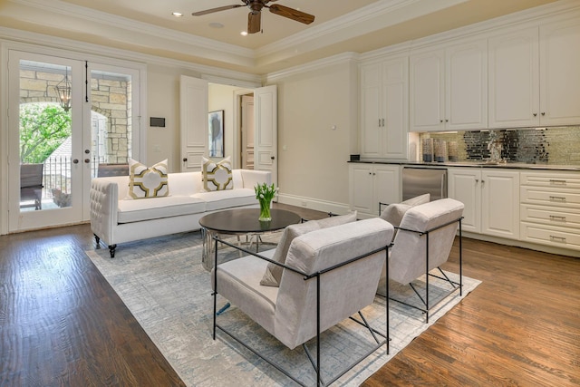 9996 Hollow Way Rd, Dallas, TX 75220 - living area featuring dark wood-style floors, a ceiling fan, a raised ceiling, recessed lighting, and ornamental molding