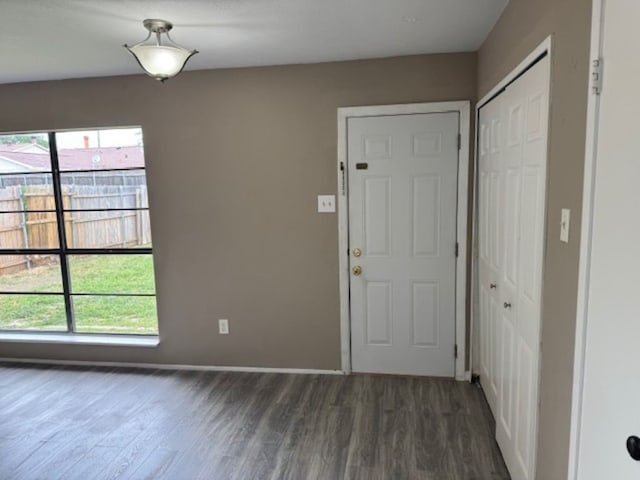 511 Hanover Dr, Allen, TX 75002 - foyer featuring wood finished floors, healthy amount of natural light, and baseboards