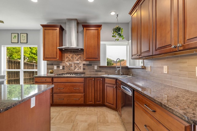 6821 Rochelle Dr, Plano, TX 75023 - kitchen with stainless steel appliances, wall chimney range hood, a sink, decorative backsplash, and dark stone counters