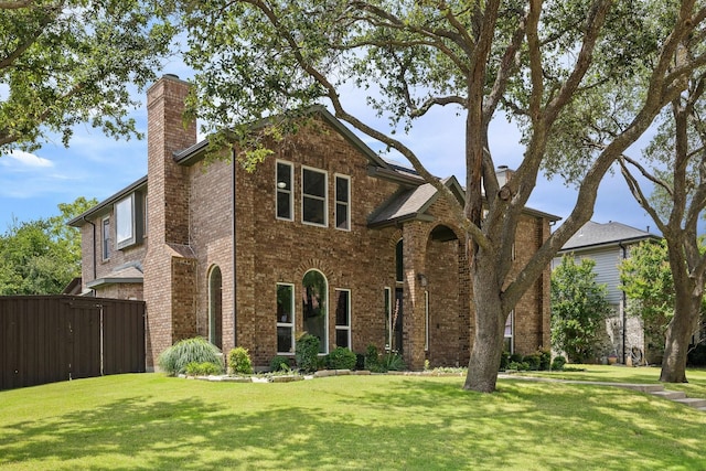 6821 Rochelle Dr, Plano, TX 75023 - traditional-style home with a chimney and brick siding