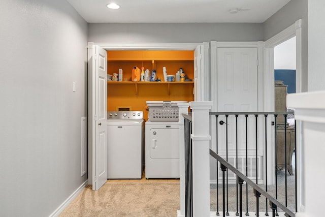 6821 Rochelle Dr, Plano, TX 75023 - laundry room featuring washer and clothes dryer, light colored carpet, and baseboards