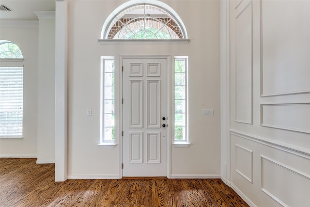3313 Shady Valley Rd, Plano, TX 75025 - entryway featuring wood finished floors, baseboards, and crown molding