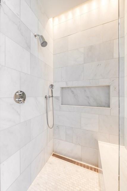 1747 Leonard St Unit 903, Dallas, TX 75201 - full bathroom with a tile shower