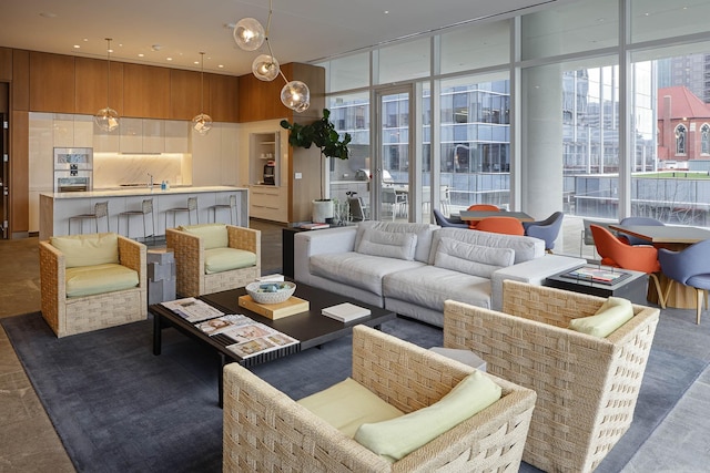 1747 Leonard St Unit 903, Dallas, TX 75201 - common area featuring floor to ceiling windows and a sink