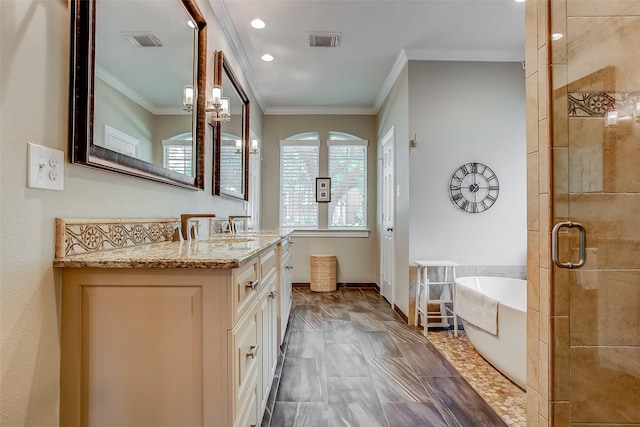 6712 E Park Dr, Fort Worth, TX 76132 - full bathroom featuring a freestanding tub, a shower stall, vanity, ornamental molding, and recessed lighting