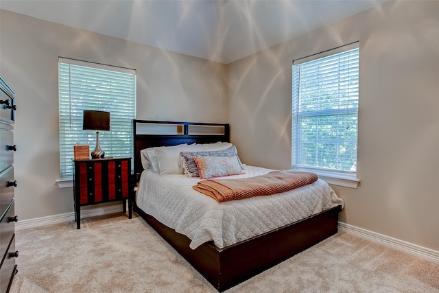 6712 E Park Dr, Fort Worth, TX 76132 - bedroom with multiple windows, carpet floors, and baseboards