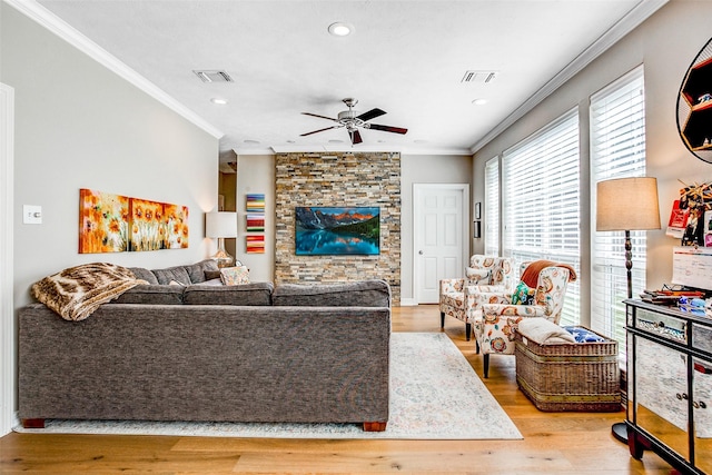 6712 E Park Dr, Fort Worth, TX 76132 - living room with ornamental molding, ceiling fan, light wood-type flooring, recessed lighting, and a stone fireplace