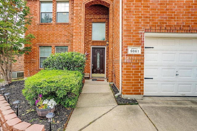 9861 Willowick Ave, Fort Worth, TX 76108 - doorway to property featuring brick siding and central AC