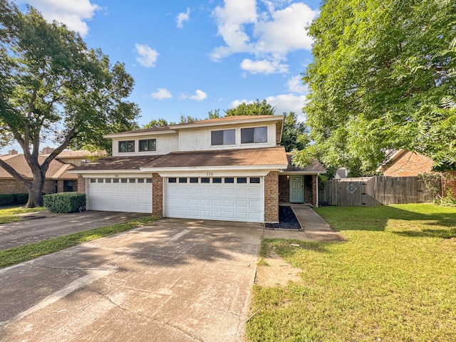 539 Mel Ct, Euless, TX 76039 - view of front of property featuring concrete driveway, a garage, and brick siding