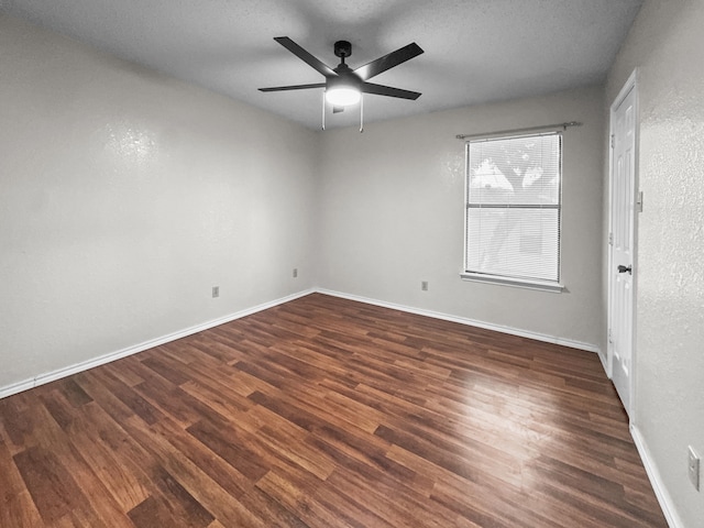 539 Mel Ct, Euless, TX 76039 - unfurnished room with wood finished floors, a ceiling fan, baseboards, and a textured wall