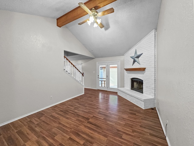 539 Mel Ct, Euless, TX 76039 - unfurnished living room featuring ceiling fan, baseboards, stairs, wood finished floors, and a textured wall