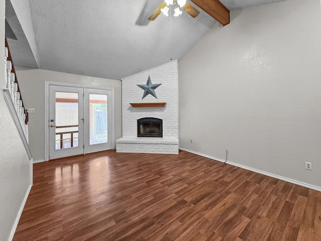 539 Mel Ct, Euless, TX 76039 - unfurnished living room featuring ceiling fan, wood finished floors, baseboards, and a brick fireplace