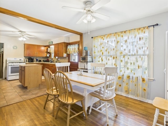 104 Sunny Ln, Athens, TX 75751 - dining area with ceiling fan, healthy amount of natural light, and light wood finished floors