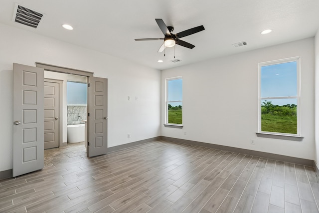 106 Maverick Way, Boyd, TX 76023 - unfurnished room featuring a ceiling fan, wood finished floors, baseboards, and recessed lighting