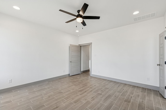 106 Maverick Way, Boyd, TX 76023 - spare room with ceiling fan, light wood-style floors, recessed lighting, and baseboards