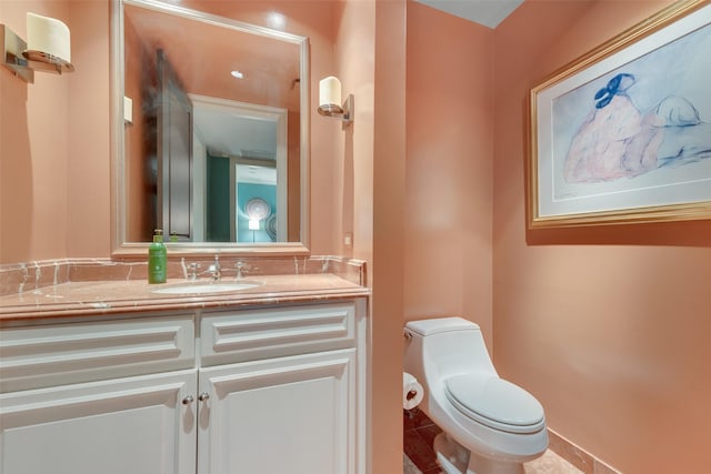 3505 Turtle Creek Blvd Unit 3G, Dallas, TX 75219 - bathroom with toilet, vanity, and tile patterned floors
