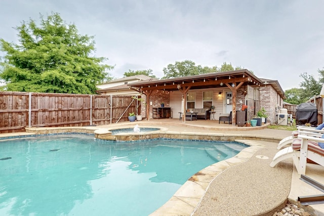 1211 Leeward Ln, Wylie, TX 75098 - view of swimming pool with a fenced backyard, a patio, and a pool with connected hot tub