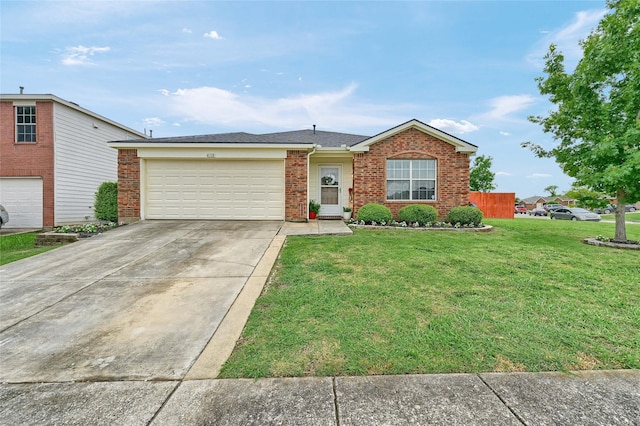 4318 Quail Run Rd, Sherman, TX 75092 - view of front of house with concrete driveway, a front yard, a garage, and brick siding