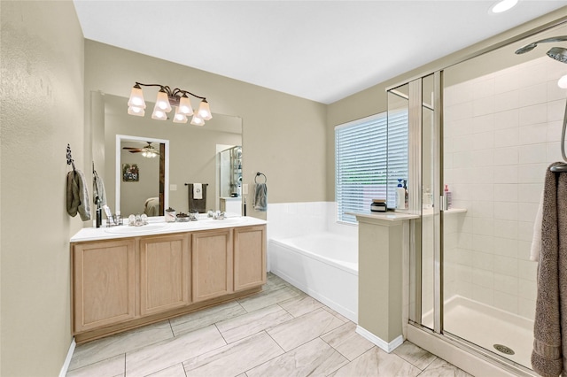 4318 Quail Run Rd, Sherman, TX 75092 - bathroom featuring a bath, a shower stall, double vanity, and ceiling fan