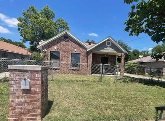 4825 Fitzhugh Ave, Fort Worth, TX 76105 - view of front of property with brick siding and a gate