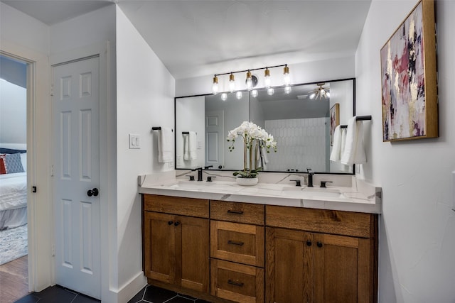 6819 Santa Fe Ave, Dallas, TX 75223 - ensuite bathroom with double vanity and baseboards