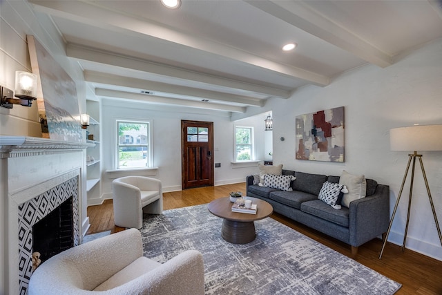 6819 Santa Fe Ave, Dallas, TX 75223 - living room featuring a fireplace, wood finished floors, baseboards, beamed ceiling, and recessed lighting