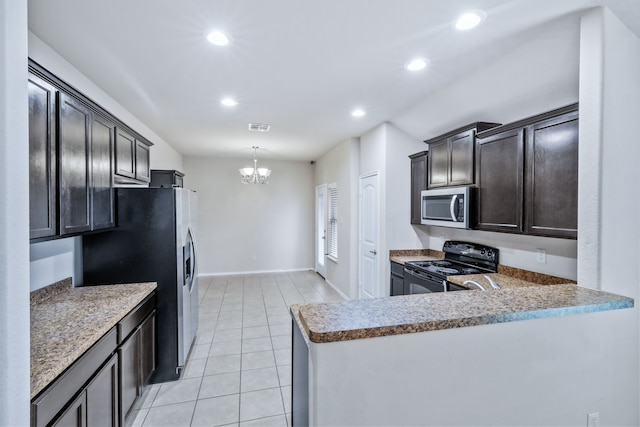608 W Grove Cir, Anna, TX 75409 - kitchen with stainless steel appliances, light tile patterned floors, a chandelier, recessed lighting, and baseboards