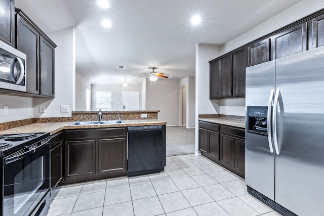 608 W Grove Cir, Anna, TX 75409 - kitchen featuring black appliances, a sink, a ceiling fan, light tile patterned floors, and dark countertops