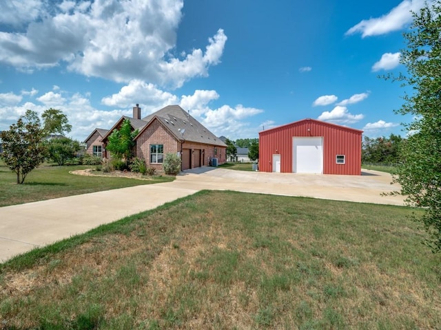 2840 Rock Hill Rd, Aubrey, TX 76227 - view of front of house featuring a front yard, a chimney, a garage, board and batten siding, and brick siding