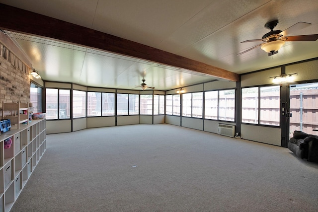 1446 Foxwood Ln, Rockwall, TX 75032 - unfurnished sunroom featuring carpet floors, beam ceiling, and a wall mounted AC