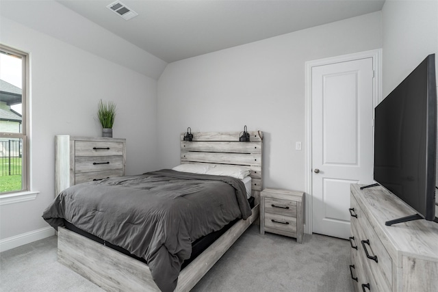 1230 Driftwood Ln, Lucas, TX 75002 - bedroom with light colored carpet, lofted ceiling, and baseboards