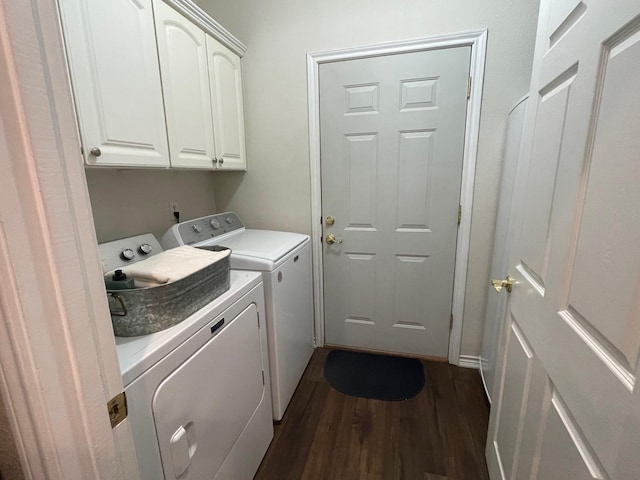 102 Dogwood Cir, Daingerfield, TX 75638 - laundry room with washing machine and dryer, cabinet space, and dark wood-type flooring